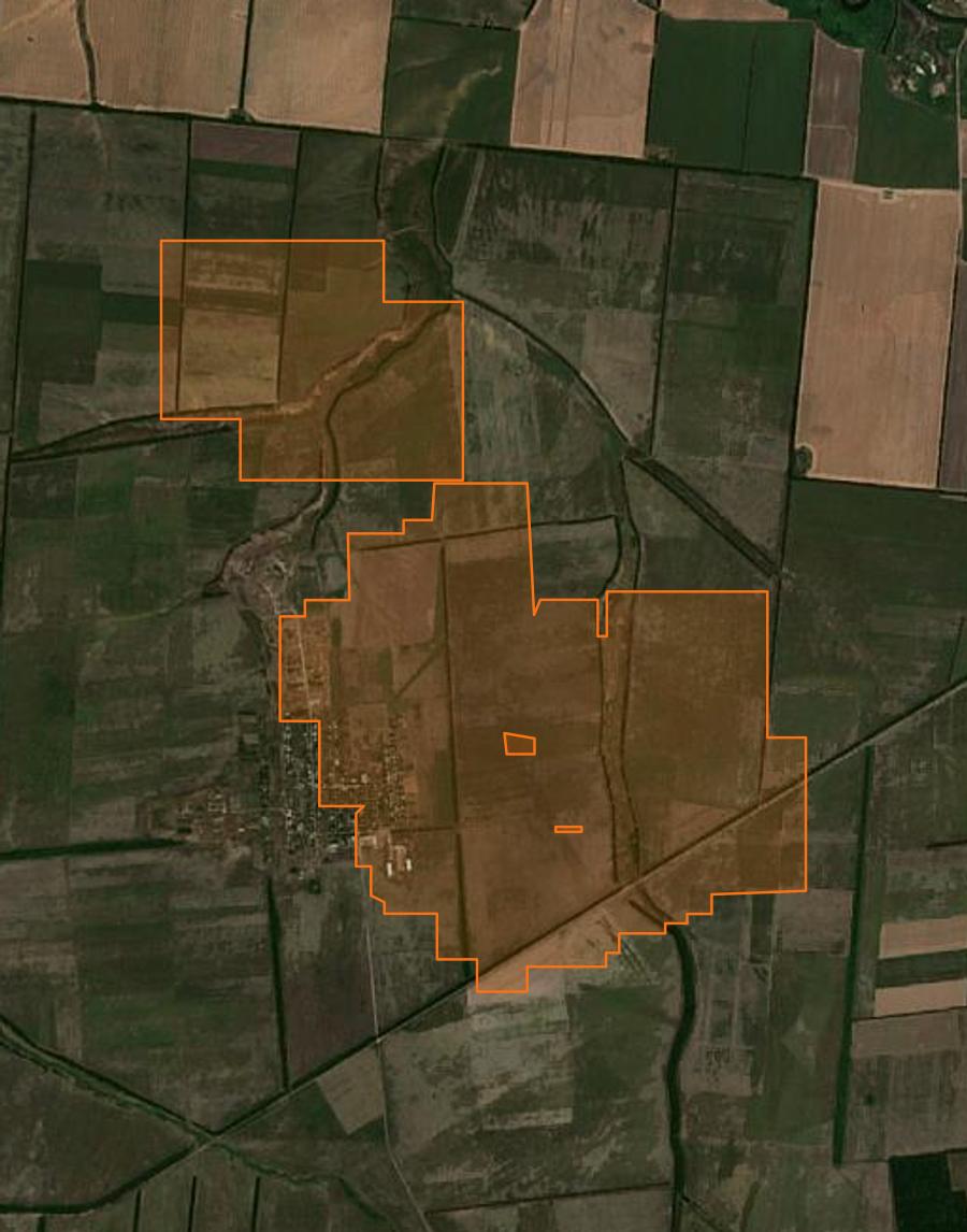 Outline of the burned area near Вугледарська міська громада (UA), drawn over satellite imagery