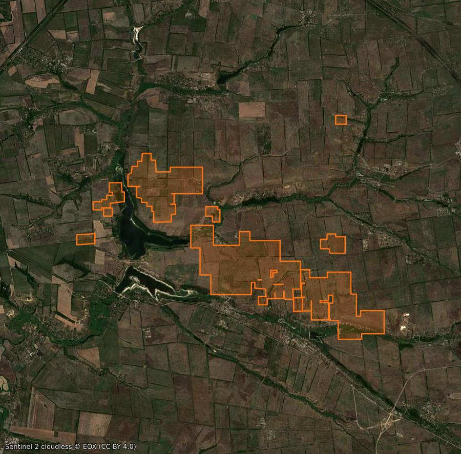 Outline of the burned area near Очеретинська селищна громада (UA), drawn over satellite imagery